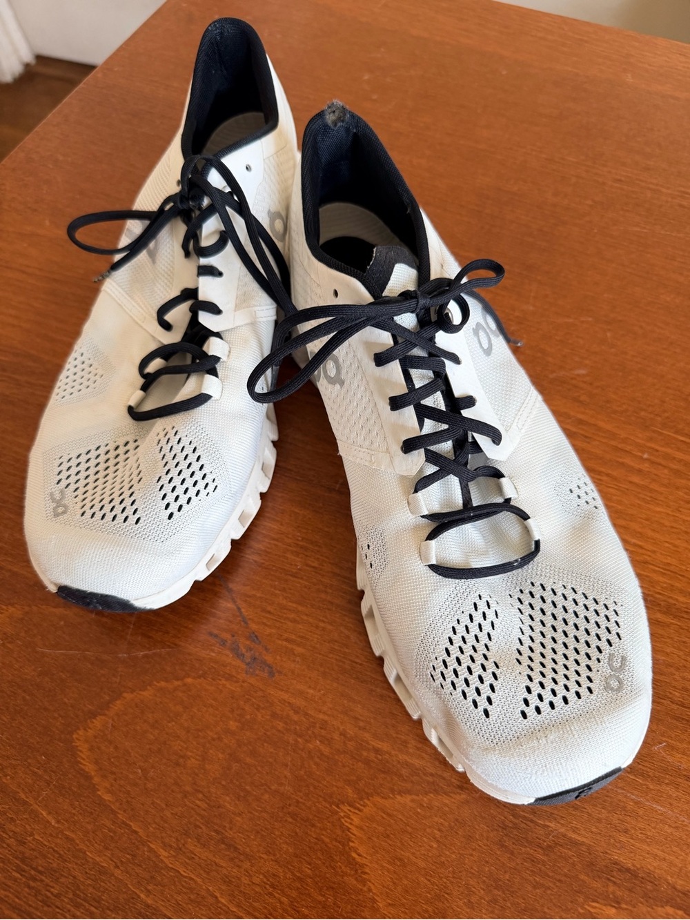 On Running Men’s White Sneakers with Black Details